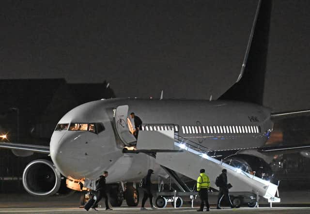 Photos taken by Dave Nelson show the Arsenal players boarding the aircraft following their shock loss to Fleetwood.