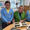Head of School Miss Haslam and members of the Pupil Leadership Team take a trip down memory lane as they explore Moor Park’s school archive ahead of its 75th anniversary