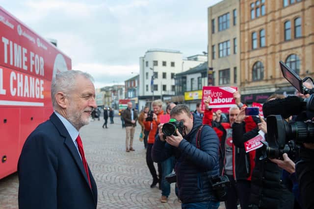 Labour Party leader Jeremy Corbyn poses in front of the battlebus in Blackpool during General Election campaigning on Tuesday November 12, 2019 (Picture: Joe Giddens/PA Wire)