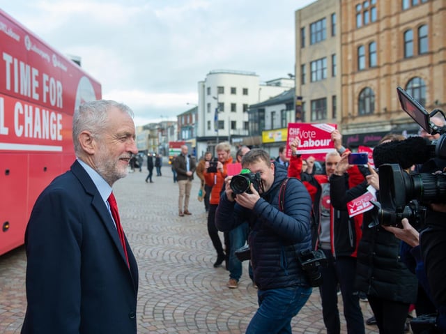 Labour Party leader Jeremy Corbyn poses in front of the battlebus in Blackpool during General Election campaigning on Tuesday November 12, 2019 (Picture: Joe Giddens/PA Wire)