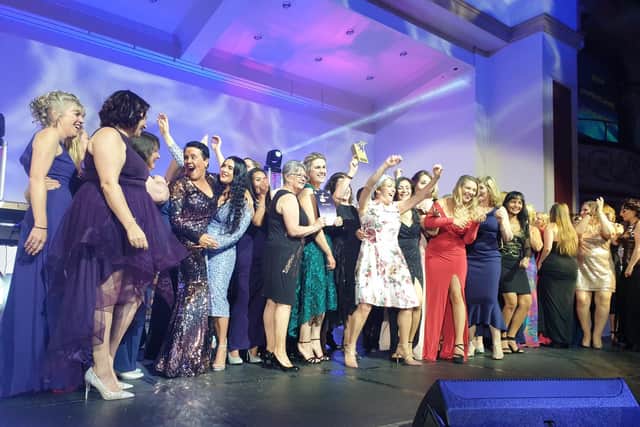 The team from Clifton Hospital on stage to collect the Chairman's Award at the Cebrating Success awards at Blackpool's Empress Ballroom