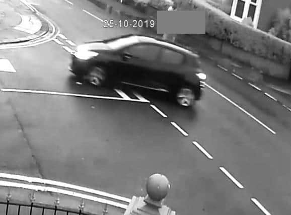Following CCTV enquiries, detectives are keen to trace the driver of this dark-coloured Renault Clio, who is believed to have witnessed the offence. Pic: Lancashire Police