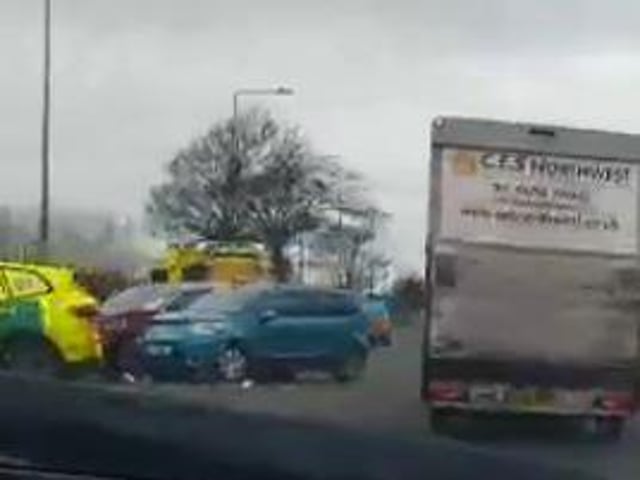Traffic passing the scene of the crash