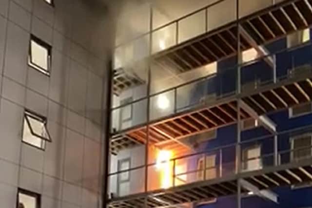 Handout videograb of the fire after it had just started on the top floors of a student accommodation building in Bolton, Greater Manchester. The fire eventually spread and engulfed the entire six-storey building. Picture: Rafaela Nunes/PA Wire