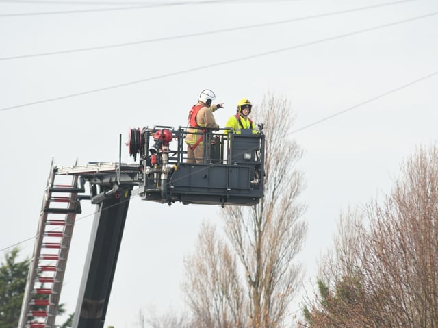 The roof has collapsed at the home and the fire service said the building has suffered "100 per cent damage"