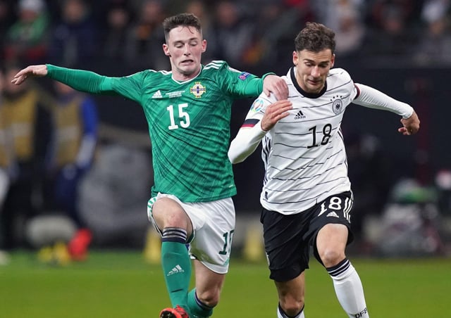 Northern Ireland's Jordan Thompson and Germany's Leon Goretzka