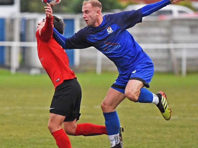 Jack Iley in airborne action for Squires Gate against Rylands Picture: ALBERT COOPER