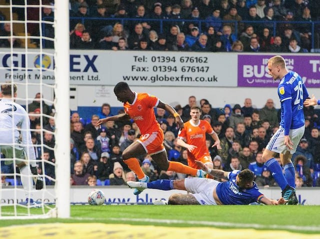 Sullay Kaikai is brought down by Luke Chambers for Blackpool's penalty, which was dispatched by Jay Spearing