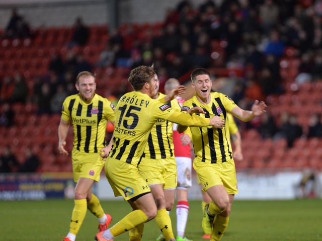 Danny Philliskirk celebrates his winning goal at Wrexham