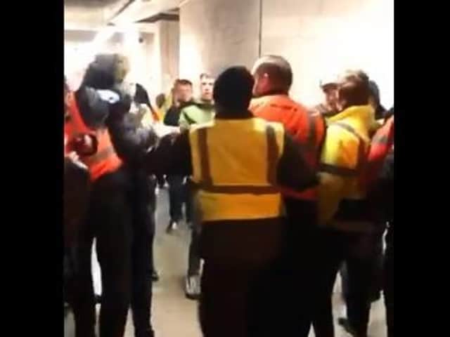 A six-second video was posted to Twitter by @_leeogden of a steward punching a hooded man. Blackpool FC said it was investigating the clip (Picture: @_leeogden/Twitter)