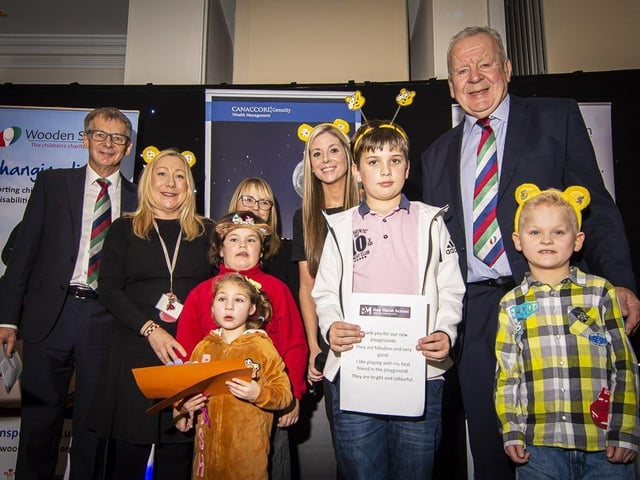 Guests and youngsters at the Wooden Spoon charity lunch. Fylde resident, and chairman of World Rugby, Bill Beaumont, is pictured second from right Picture: Rachel Lambert (Rachel Emma Creatives)