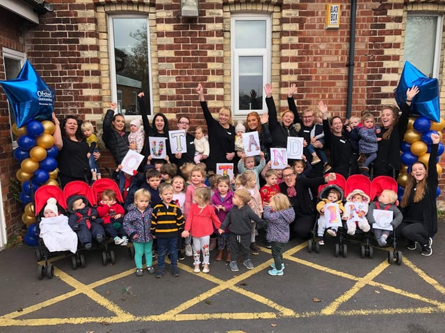 Staff and children at Poppy and Jacks celebrate the report