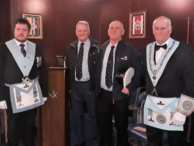 From left: Adam Simpson (Immediate Past Master), Captain David Eccles
(Operations Manager, Fleetwood RNLI), Tony Cowell (Coxswain, Fleetwood RNLI), Barrie Whiteside (Worshipful Master of Onward Lodge