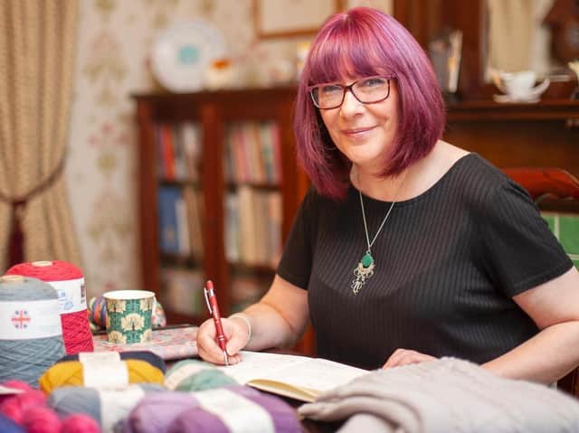 Paula Chew from Westcliffe Guest House knitting hotel