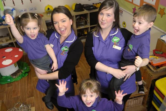 Early years practioners Sharnie Williams and Laura Hill with Lily Percival, Chloe Bamforth and Riley Hawkins, when Treetops was ranked 'outstanding' in March 2016 (Picture: Dan Martino for JPIMedia)