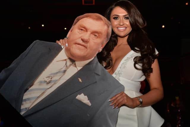 Charlotte Dawson with a cardboard cut out of her comedy legend dad Les at the launch of fashion range Fredafunk in Manchester last year (Picture: Dave Nelson)