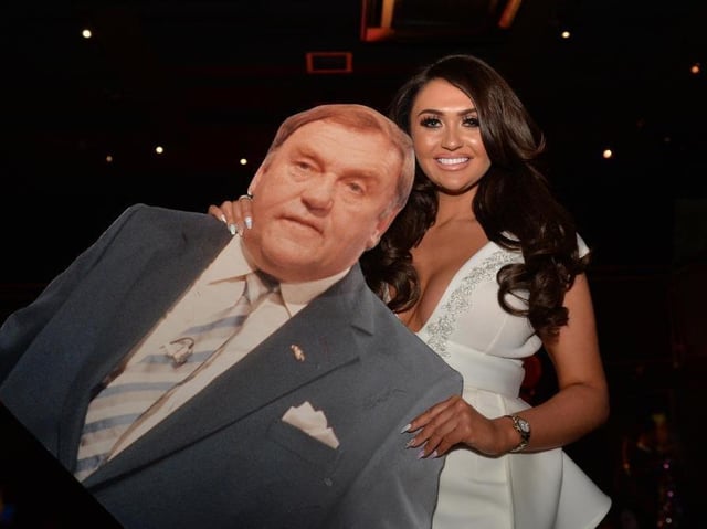 Charlotte Dawson with a cardboard cut out of her comedy legend dad Les at the launch of fashion range Fredafunk in Manchester last year (Picture: Dave Nelson)