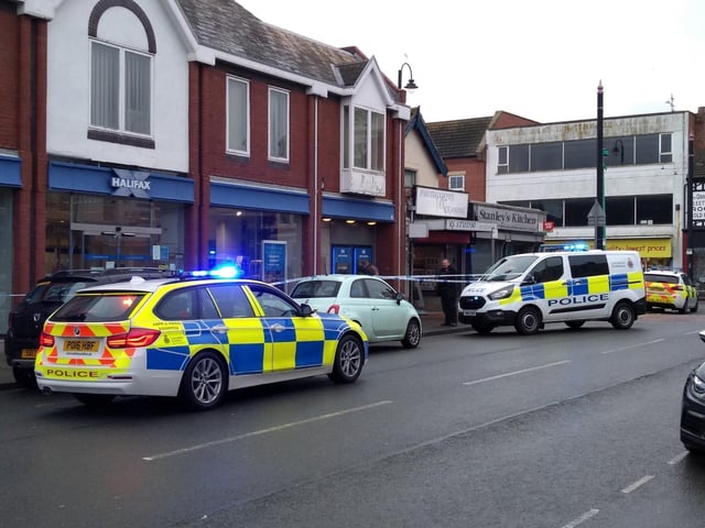 Police said Halifax bank was targeted by an armed robber demanding cash from staff at around 9.10am (December 12)