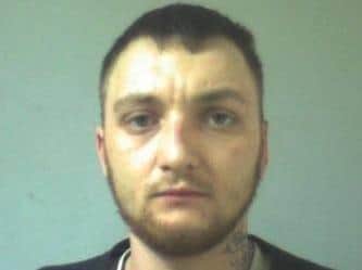 Daniel McLaughlin, 26, of Warbreck Hill Road, is wanted in connection with an assault in Richmond Road at around 2pm on August 24. Pic: Lancashire Police