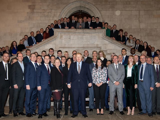 Prime Minister Boris Johnson alongside the newly elected Conservative MPs