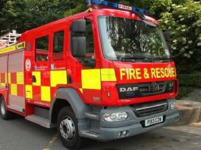 Fire crews wearing breathing apparatus put out the blaze.