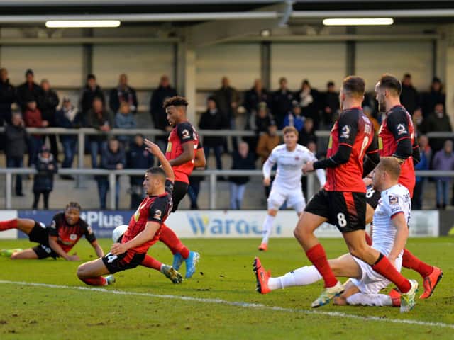 Dan Bradley's cross goes in off Yeovil's Gabriel Osho to put Fylde in front Picture: STEVE MCLELLAN