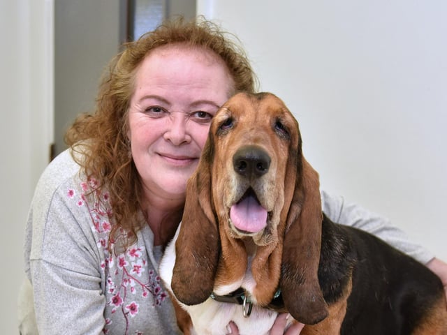 Denise Felton, with bassett hound Jethro.