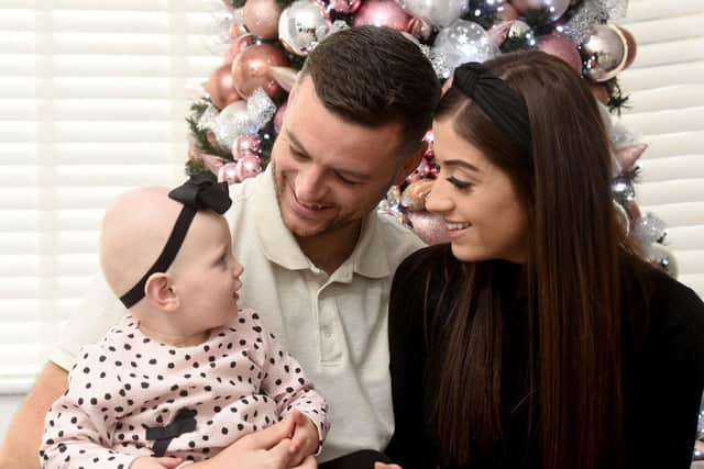 Dan Mottram and Frankie Butterworth with their little girl Elsie.