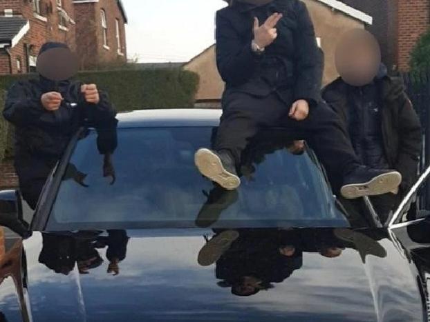 Daft yobs in burglary gang posted picture of themselves posing with this stolen car on Facebook