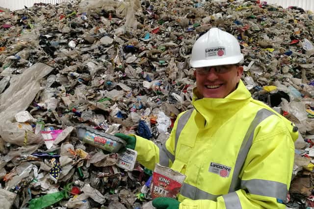 William Maxwell, Lancashire County Council's waste service manager, with some examples of the plastic pots and tubs which can now be recycled in household waste....