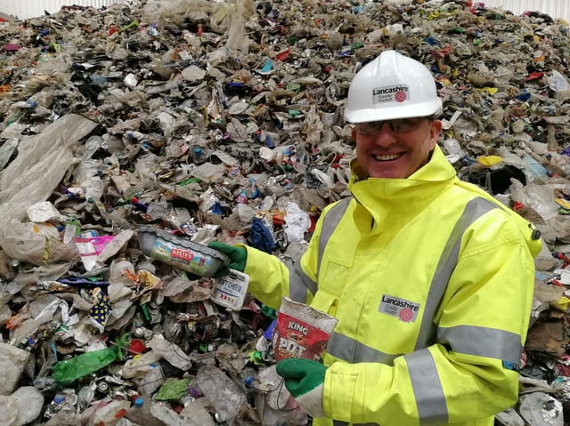 William Maxwell, Lancashire County Council's waste service manager, with some examples of the plastic pots and tubs which can now be recycled in household waste....