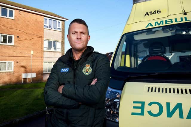 Dave Boardman, 42, has relived the moment he and his paramedic colleague Alan Mitchell raced towards a burning block of flats (Picture: Dan Martino for JPIMedia)