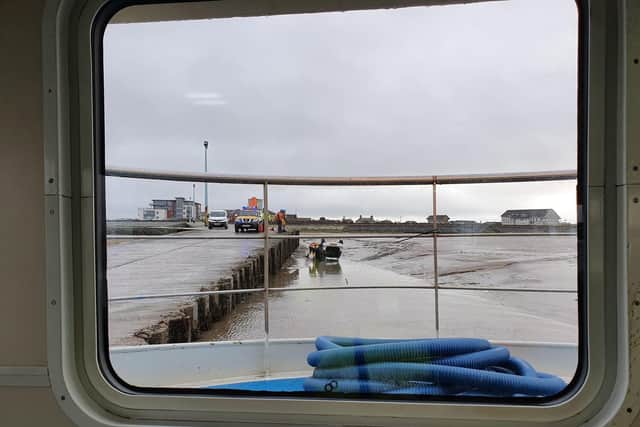Coastguard volunteers had to wait until low tide before recovering the Vauxhall Corsa from the sea on Sunday, January 5. Pic: HM Coastguard Fleetwood