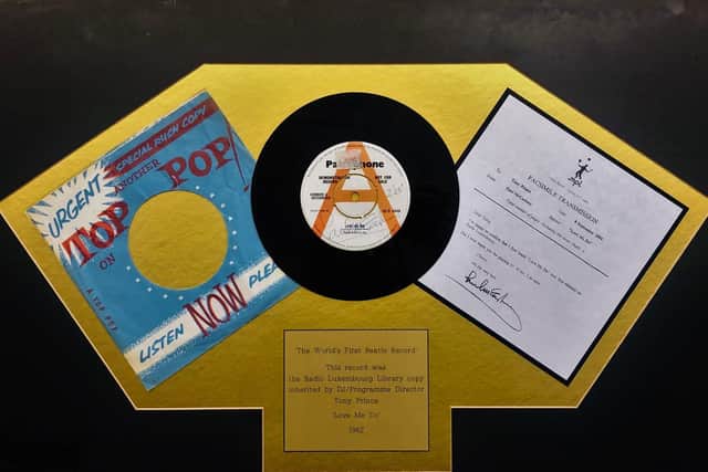 The first Beatles record to be played on the radio which is being sold by the auction house on January 28 - complete with the misspelling of Sir Paul McCartney's name.