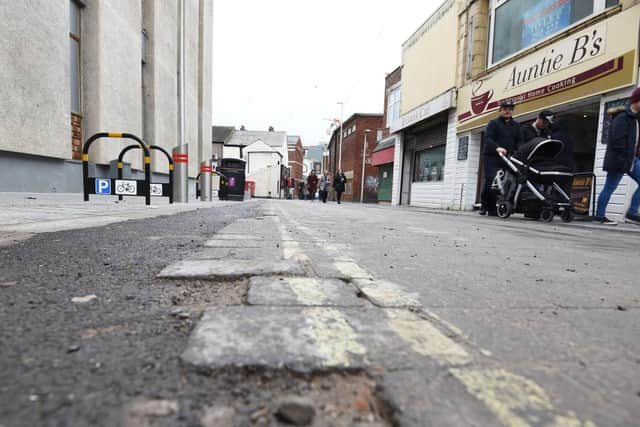 There were concerns after workmen vanished from Deansgate in Blackpool, leaving behind uneven paving and scar-like streaks of asphalt, but the council has allayed fears by saying the work has yet to be finished (Picture: Daniel Martino for JPIMedia)