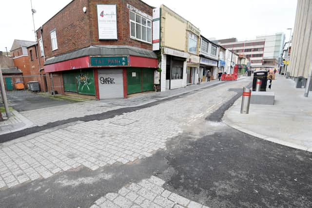 It's pointless to resurface the road while work on shops such as Tai Pan has yet to be completed, the council said (Picture: Daniel Martino for JPIMedia)