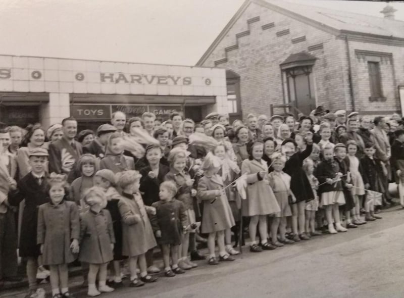 Children line the street near the old Fleetwood Railway Station to welcome Princess Margaret