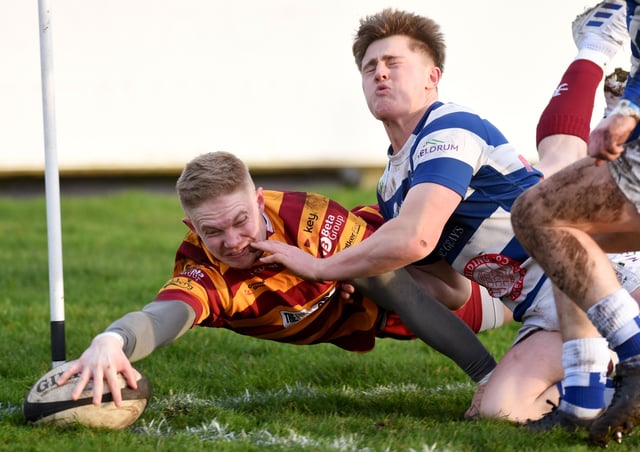 Fylde's Tom Carleton scores a try