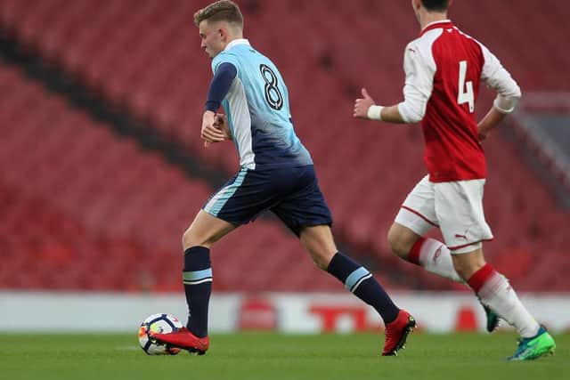 Roache in action against Arsenal at the Emirates Stadium during Blackpool's FA Youth Cup semi-final