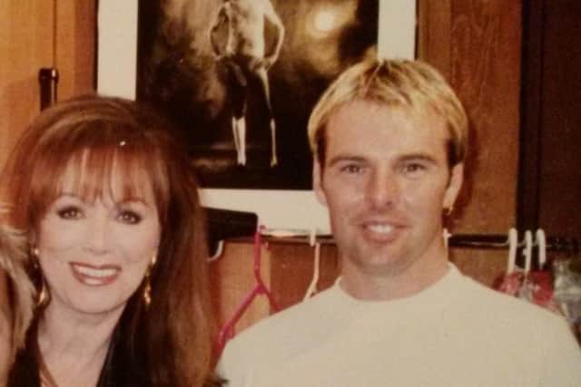 Blackpool hair salon owner Tony Cox with Jackie Collins