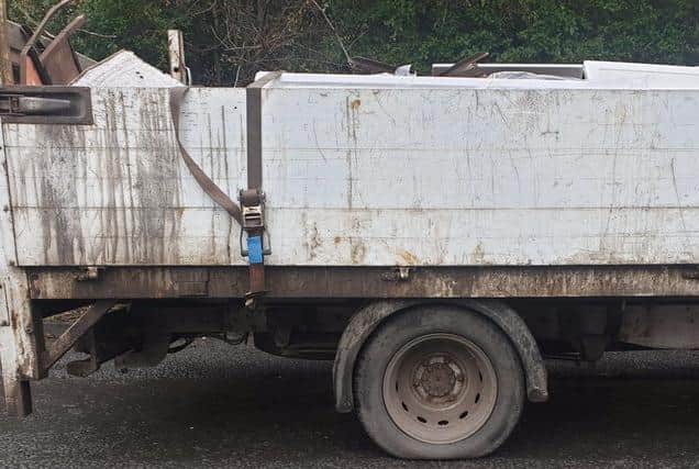 The van appears to have been carrying scrap metal secured by a single strap.(Photo by Lancashire Road Police)