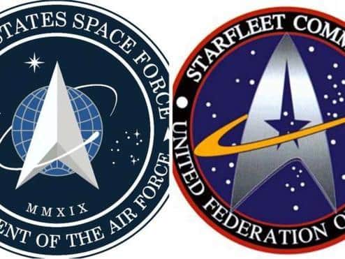 US Space Force logo on left and the Star Trek emblem on right