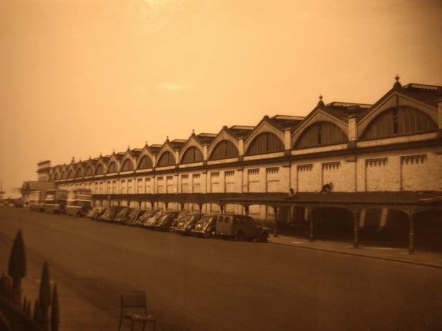 This photo is captioned onthe back as the new Queen Shelter which ran the length of the train station in Queens Terrace