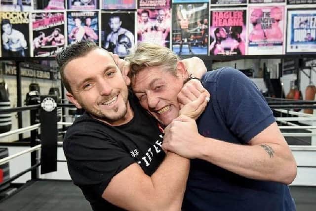 William Regal training with RP Davies who applies a headlock