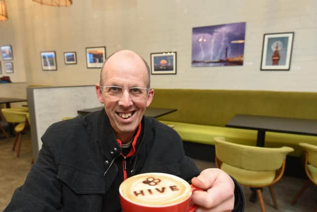 Blackpool photographer Stephen Cheatley at the Hive Coffee Shop where he is displaying his first exhibition through February.