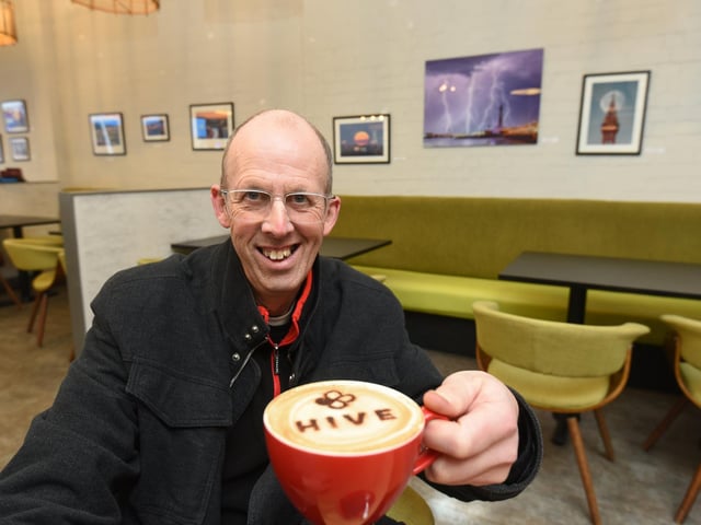 Blackpool photographer Stephen Cheatley at the Hive Coffee Shop where he is displaying his first exhibition through February.