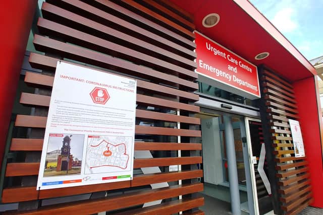 A warning outside Blackpool Victoria Hospital's A&E department tells people with coronavirus symptoms not to go inside