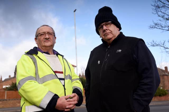 David Bird and Nick Barker are fed up that a lampost that has been broken since June has not been fixed by the council.