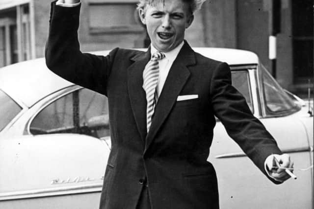 Entertainer Tommy Steele, cigarette in hand, in Blackpool in 1957 - the year when his big hits Singing The Blues, Butterfingers and Water Water were all top of the hit parade