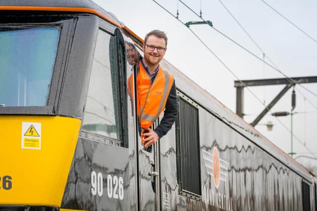 Paul Batty of Grand Central with one of the Class 90 locomotives which will run from Blackpool to London